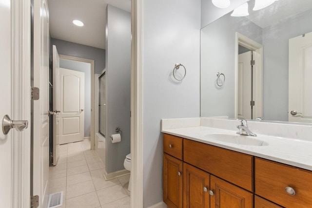 769 Brighton Dr, Sugar Grove, IL 60554 - bathroom with toilet, vanity, tile patterned flooring, shower / bath combination with glass door, and baseboards