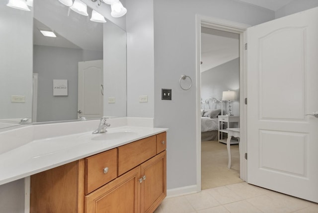 769 Brighton Dr, Sugar Grove, IL 60554 - ensuite bathroom featuring vanity, tile patterned floors, and vaulted ceiling