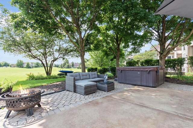 769 Brighton Dr, Sugar Grove, IL 60554 - view of patio with a hot tub and an outdoor living space with a fire pit