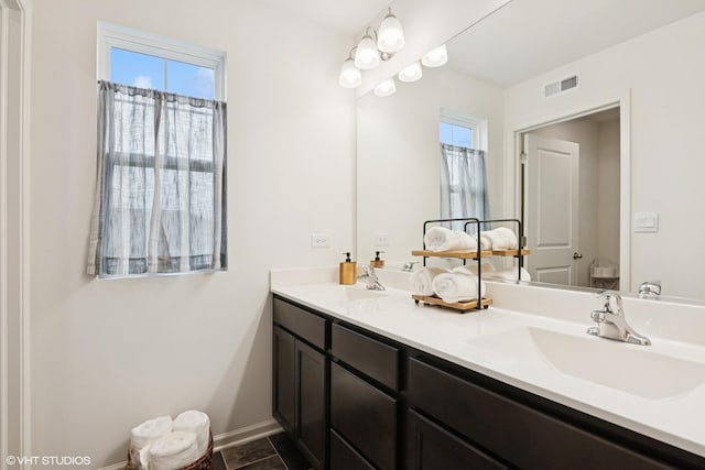 25354 W Cerena Cir, Plainfield, IL 60586 - bathroom with double vanity, toilet, plenty of natural light, and baseboards