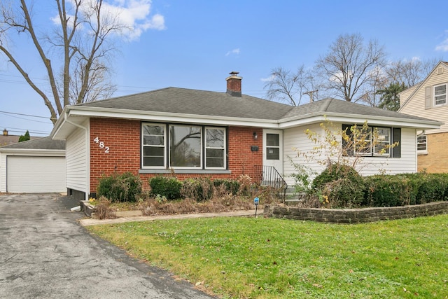 482 Fitch Rd, Chicago Heights, IL 60411 - single story home with a chimney, a front yard, brick siding, and an outdoor structure