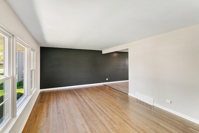 482 Fitch Rd, Chicago Heights, IL 60411 - empty room with light wood-style floors and baseboards