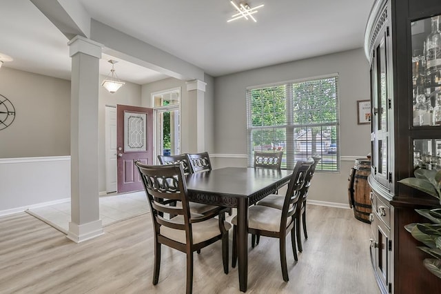 11316 Maplewood Dr, Plainfield, IL 60585 - dining room with ornate columns and light wood finished floors