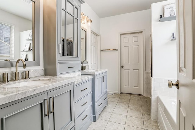 11316 Maplewood Dr, Plainfield, IL 60585 - full bath with double vanity, a tub to relax in, and tile patterned flooring