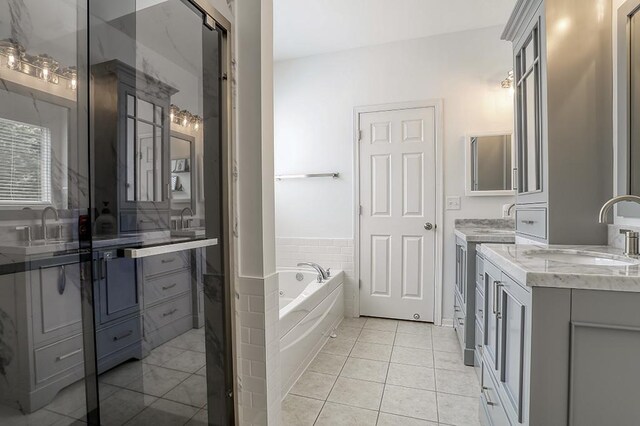 11316 Maplewood Dr, Plainfield, IL 60585 - full bathroom featuring vanity, a garden tub, and tile patterned flooring