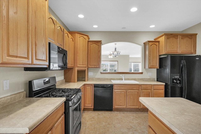 2104A Lucille Ln, Mahomet, IL 61853 - kitchen featuring black appliances, light countertops, a chandelier, recessed lighting, and light tile patterned floors