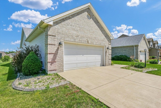 2104A Lucille Ln, Mahomet, IL 61853 - view of side of property featuring brick siding and a yard