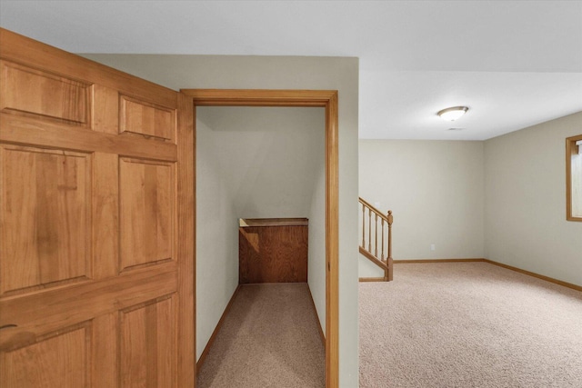 2104A Lucille Ln, Mahomet, IL 61853 - hall featuring light colored carpet and stairs