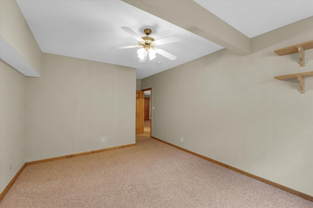 2104A Lucille Ln, Mahomet, IL 61853 - spare room featuring light carpet and a ceiling fan