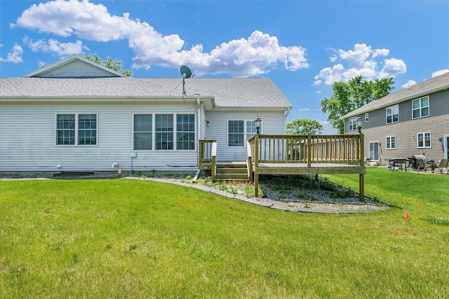 2104A Lucille Ln, Mahomet, IL 61853 - rear view of property featuring a wooden deck and a yard