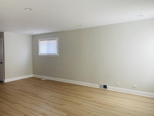 3431 N Kostner Ave, Chicago, IL 60641 - spare room featuring light wood-type flooring, baseboards, and recessed lighting