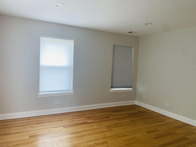 3431 N Kostner Ave, Chicago, IL 60641 - empty room with light wood-style floors, baseboards, and recessed lighting