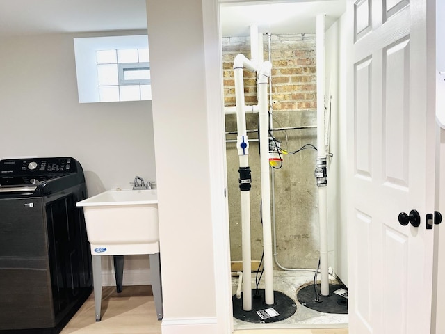 3431 N Kostner Ave, Chicago, IL 60641 - laundry room featuring washer / dryer and light wood-style floors