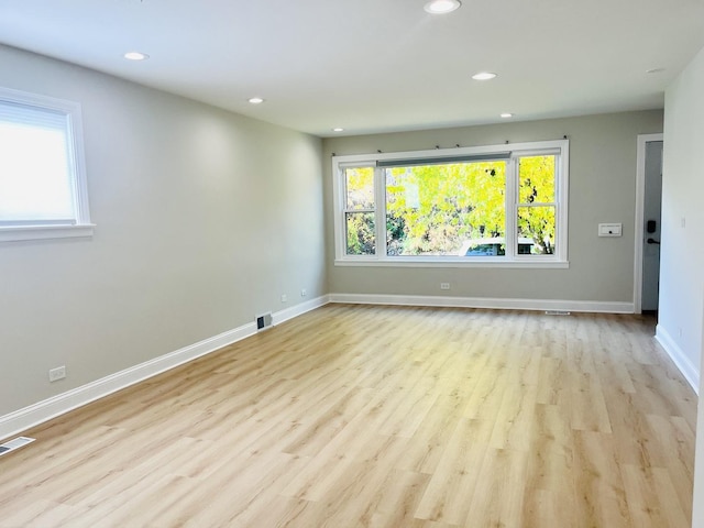 3431 N Kostner Ave, Chicago, IL 60641 - empty room featuring recessed lighting, wood finished floors, and baseboards