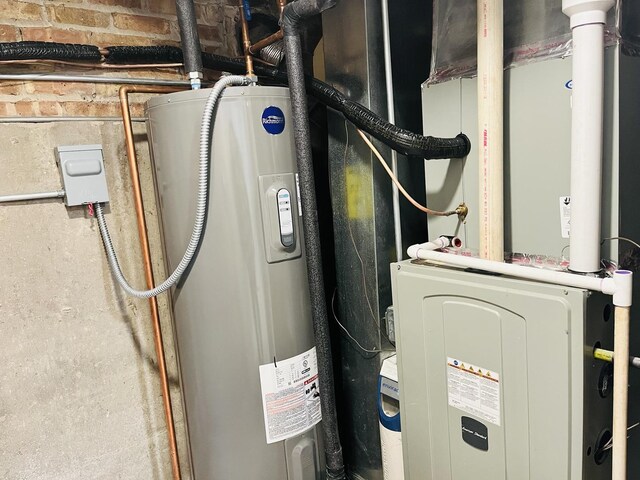 3431 N Kostner Ave, Chicago, IL 60641 - utility room with electric water heater and heating unit