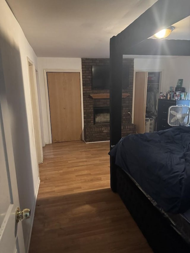 255 Mantua St, Park Forest, IL 60466 - bedroom with wood finished floors and a fireplace