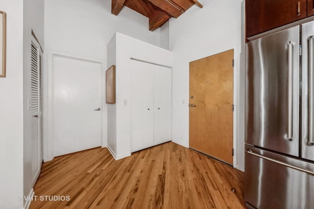 1040 W Adams St Unit 365, Chicago, IL 60607 - kitchen featuring high quality fridge, light wood-style flooring, and beam ceiling