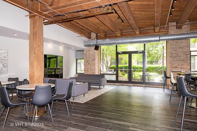 1040 W Adams St Unit 365, Chicago, IL 60607 - dining space with track lighting, wooden ceiling with exposed beams, healthy amount of natural light, and french doors