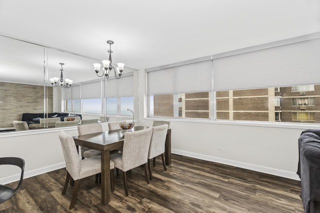 6301 N Sheridan Rd Unit 18E, Chicago, IL 60660 - dining room featuring a chandelier and dark wood-style floors