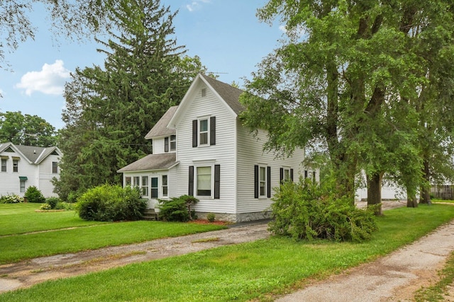 9014 Alden Rd, Harvard, IL 60033 - view of front of home with roof with shingles and a front lawn