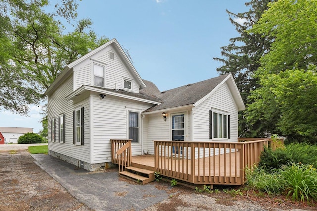 9014 Alden Rd, Harvard, IL 60033 - rear view of house with a wooden deck and a shingled roof