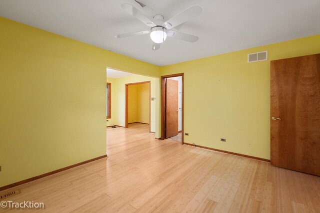 6560 Hillcrest Rd, Downers Grove, IL 60516 - empty room with ceiling fan, light wood-style flooring, and baseboards