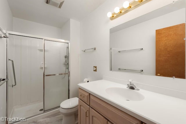 6560 Hillcrest Rd, Downers Grove, IL 60516 - bathroom with toilet, vanity, a stall shower, and marble look tiles