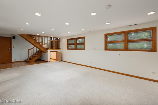 6560 Hillcrest Rd, Downers Grove, IL 60516 - unfurnished living room with recessed lighting, stairs, baseboards, and carpet flooring