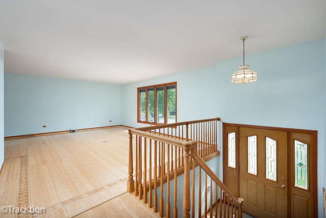 6560 Hillcrest Rd, Downers Grove, IL 60516 - entrance foyer featuring light wood-style flooring and baseboards