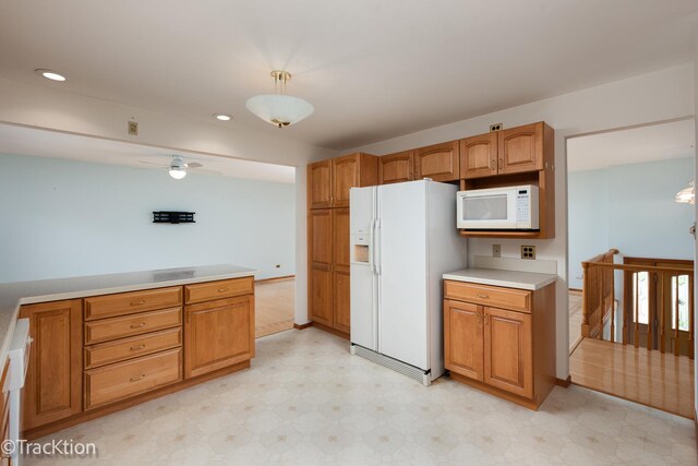 6560 Hillcrest Rd, Downers Grove, IL 60516 - kitchen featuring white appliances, light flooring, light countertops, pendant lighting, and recessed lighting