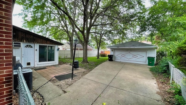 view of patio / terrace with a garage