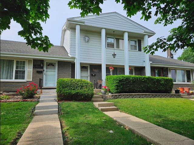 7108 Niles Ave, Niles, IL 60714 - view of front of home featuring brick siding and a front lawn