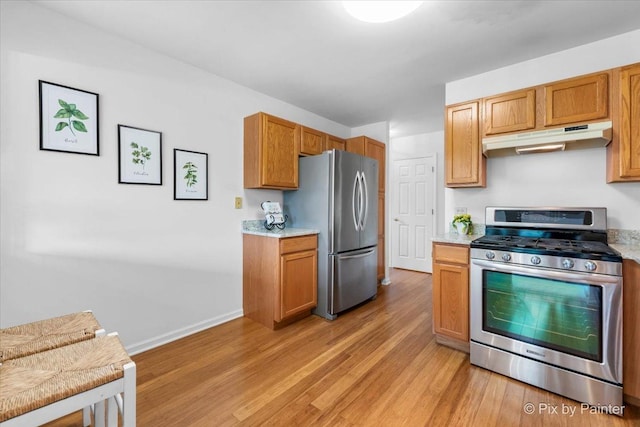 2040 Peach Tree Ln, Algonquin, IL 60102 - kitchen with appliances with stainless steel finishes, under cabinet range hood, light wood finished floors, light countertops, and baseboards
