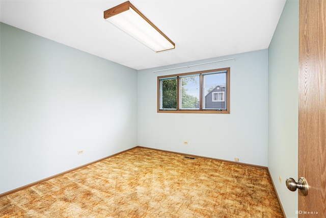 7043 W 73rd St, Nottingham Park, IL 60638 - unfurnished room featuring attic access and carpet floors