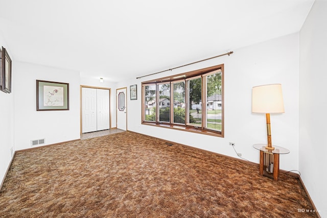 7043 W 73rd St, Nottingham Park, IL 60638 - unfurnished room featuring carpet and baseboards