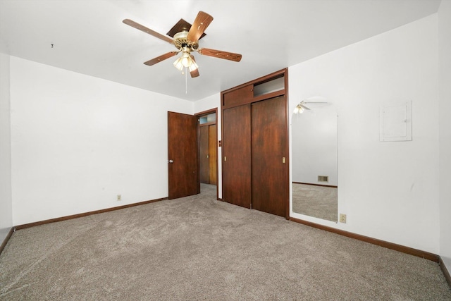 7830 S Kolmar Ave, Chicago, IL 60652 - unfurnished bedroom with carpet flooring, a closet, baseboards, and a ceiling fan