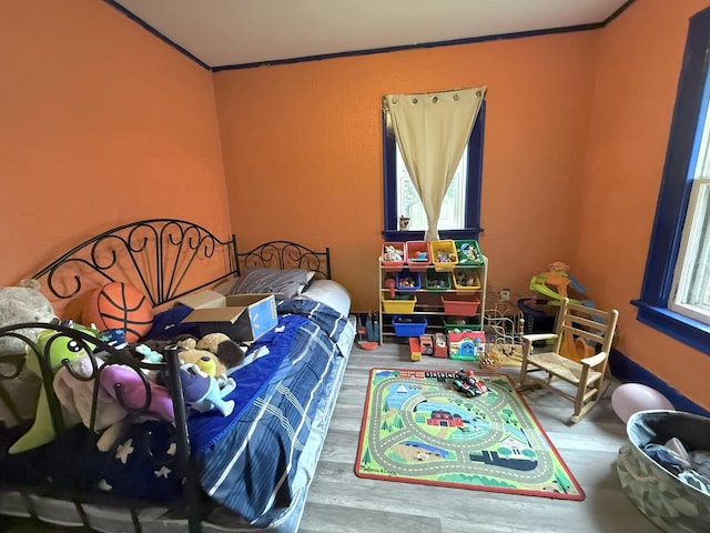 1229 W 6th St, Sterling, IL 61081 - bedroom with crown molding and wood finished floors
