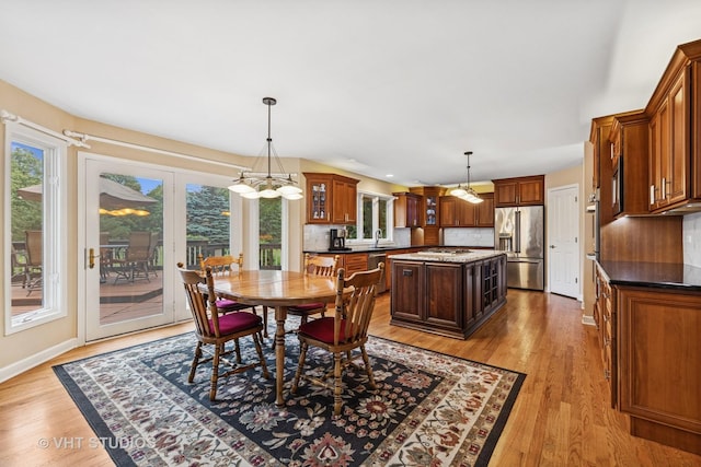 1051 Chadwick Ct, Aurora, IL 60502 - dining space featuring plenty of natural light and light wood-style flooring