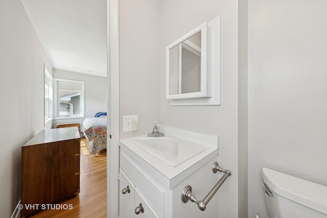 0S706 Madison St, Winfield, IL 60190 - half bath with vanity and wood finished floors