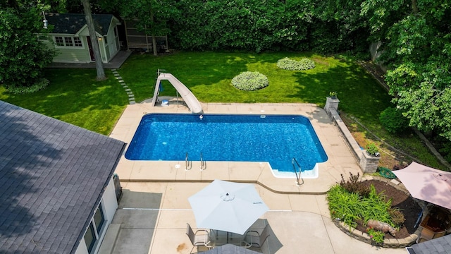 0S706 Madison St, Winfield, IL 60190 - outdoor pool featuring a water slide, a patio area, an outdoor structure, and a lawn