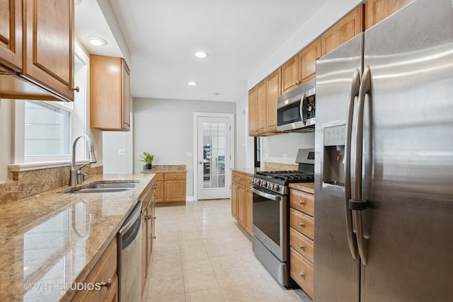 0S706 Madison St, Winfield, IL 60190 - kitchen with stainless steel appliances, light stone countertops, recessed lighting, light tile patterned floors, and brown cabinets
