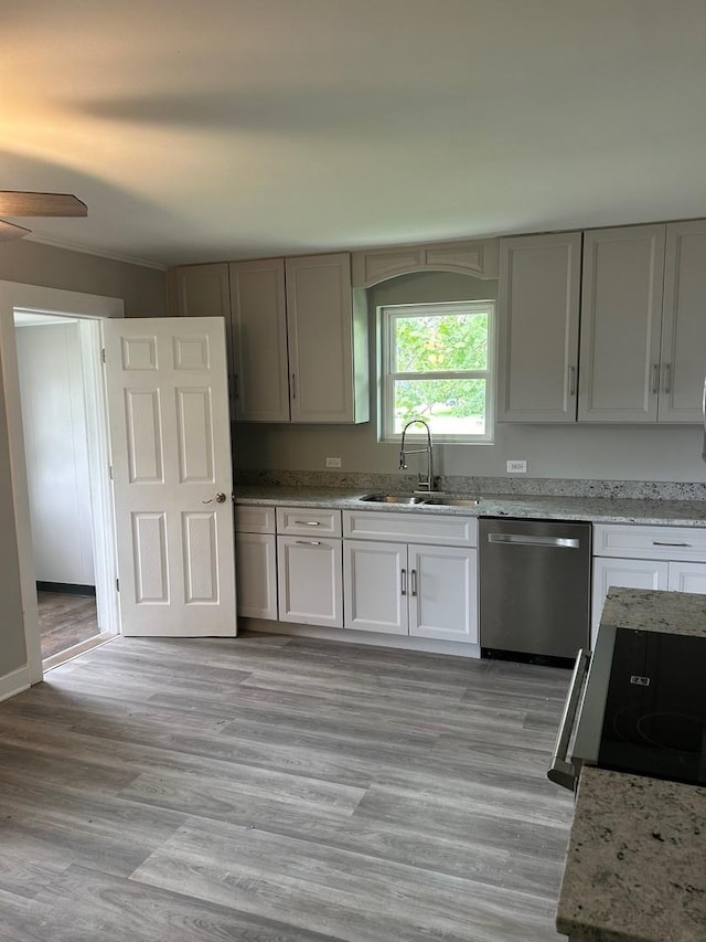 904 Johnson St, Streator, IL 61364 - kitchen featuring dishwasher, a sink, light stone counters, a ceiling fan, and electric stove