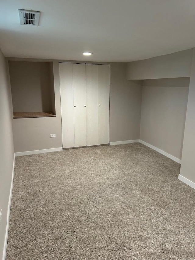 904 Johnson St, Streator, IL 61364 - finished below grade area featuring carpet flooring, baseboards, and recessed lighting