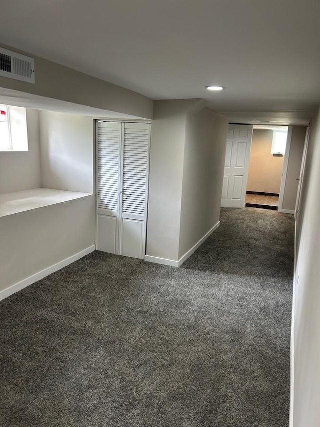 904 Johnson St, Streator, IL 61364 - basement featuring carpet flooring, baseboards, and healthy amount of natural light