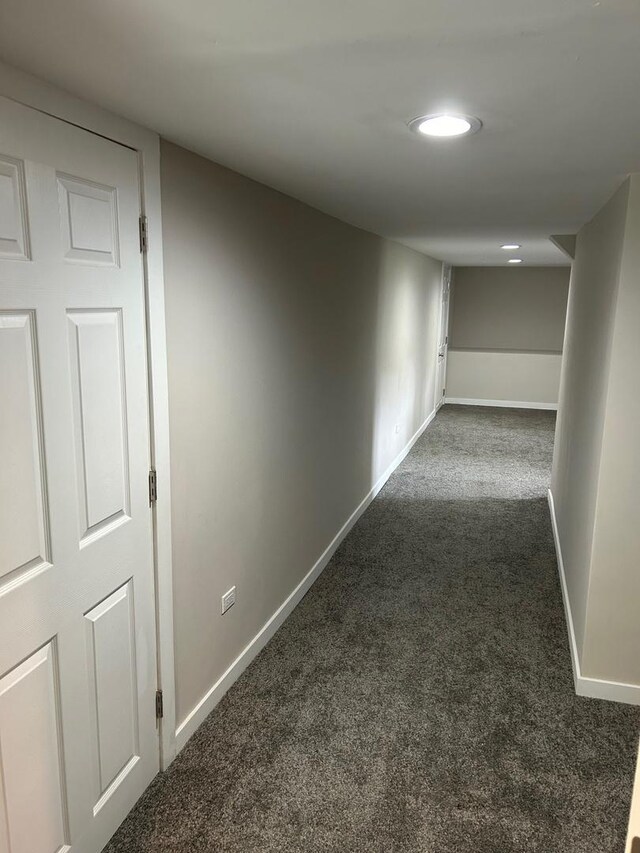 904 Johnson St, Streator, IL 61364 - corridor with dark carpet and baseboards
