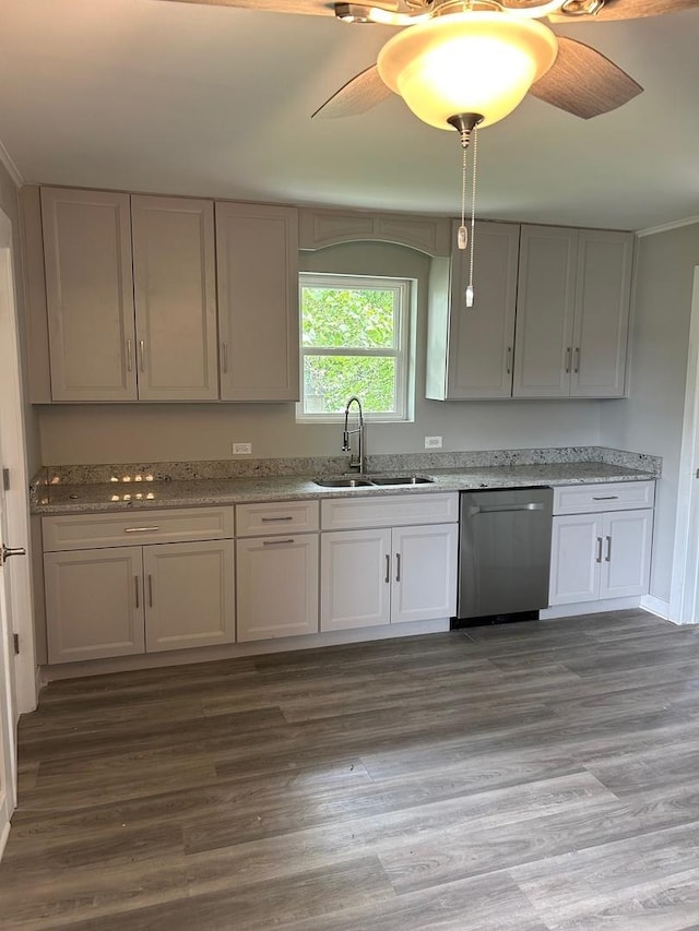 904 Johnson St, Streator, IL 61364 - kitchen featuring dishwasher, a sink, light stone countertops, and wood finished floors