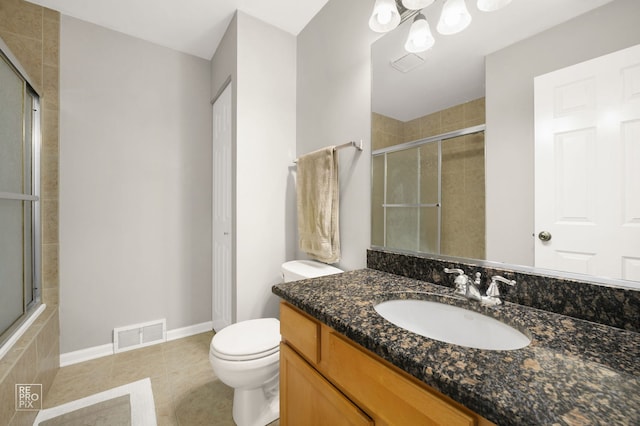525 W Washington Ave Unit 6, Lake Bluff, IL 60044 - full bathroom featuring tile patterned floors, a tile shower, vanity, and a chandelier