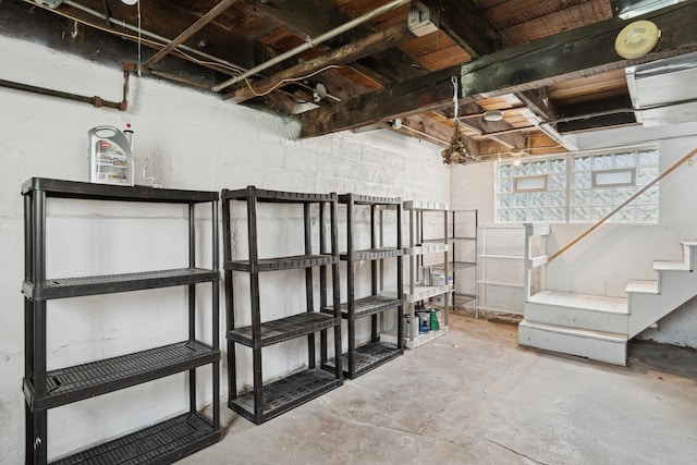 458 Douglas St, Joliet, IL 60435 - below grade area featuring stairs and concrete block wall