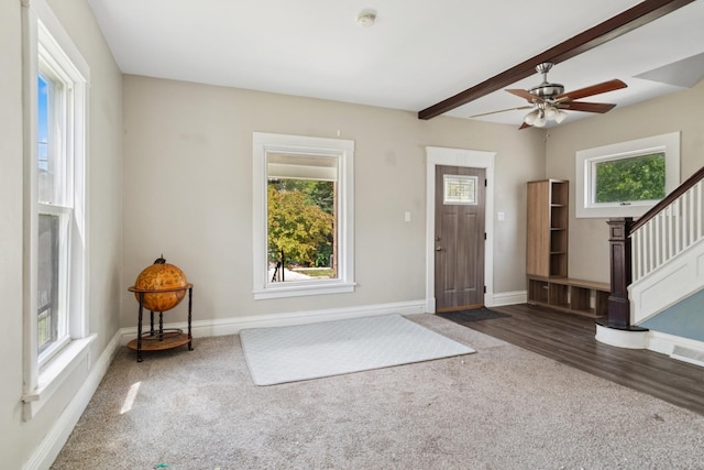 458 Douglas St, Joliet, IL 60435 - entryway featuring carpet floors, stairs, beamed ceiling, and a ceiling fan