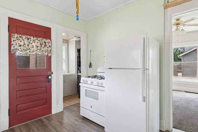 458 Douglas St, Joliet, IL 60435 - kitchen featuring white appliances, dark wood-style floors, a ceiling fan, and crown molding